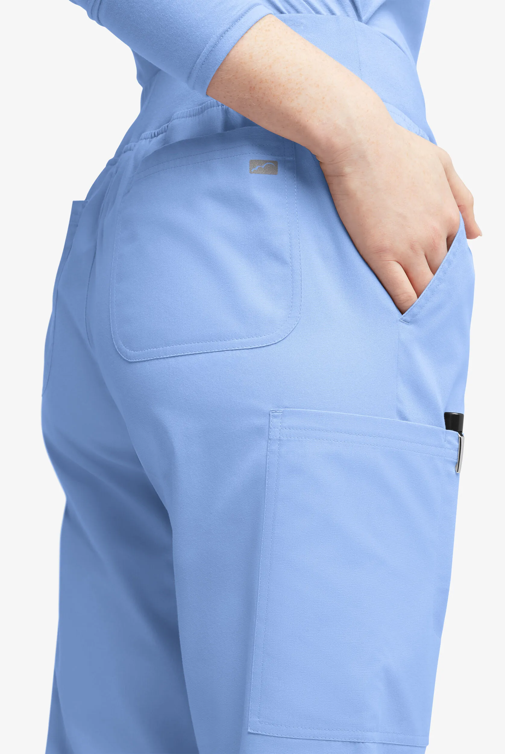 BUTTERSOFT ORIGINALS WOMEN'S 7POCKET MID RISE CROSSOVER WAIST FLARED LEG SCRUB PANTS